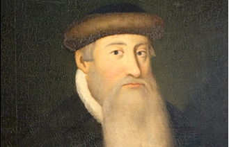 구텐베르크의 초상화. 흑빛 배경에서 모자를 쓴 채 하얀 수염을 가슴까지 기른 구텐베르크가 정면을 응시하고 있다. 
